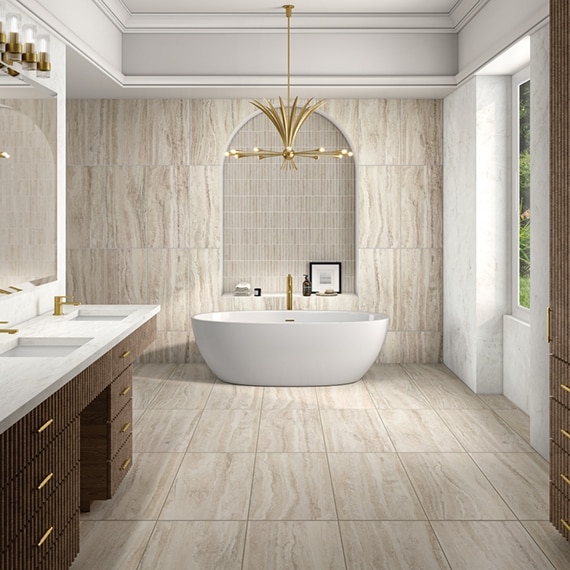 Spa bathroom clad in travertine stone with a freestanding tub